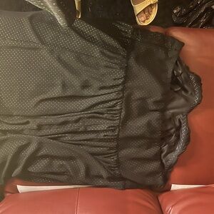 Black cocktail dress with small gold dots